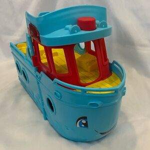 Blue and Red Toy Boat